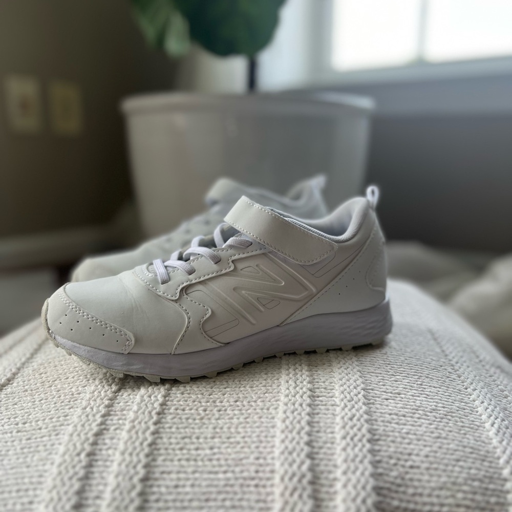 Boys new balance sneakers.